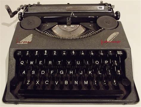 hermes featherweight typewriter.